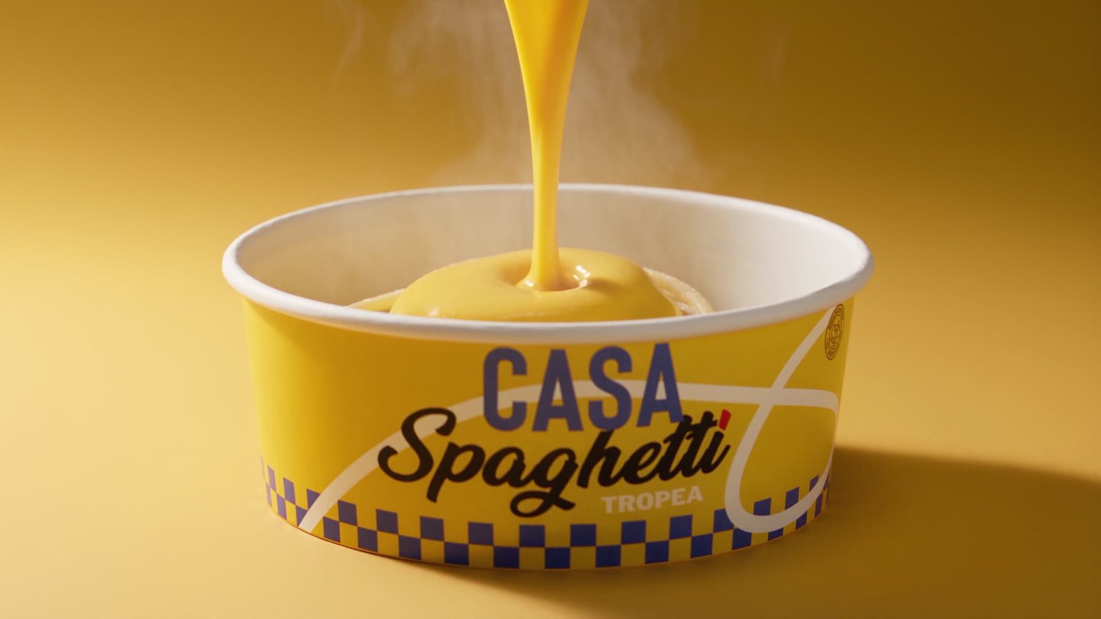 The bowl of fresh pasta with the ingredients arriving
