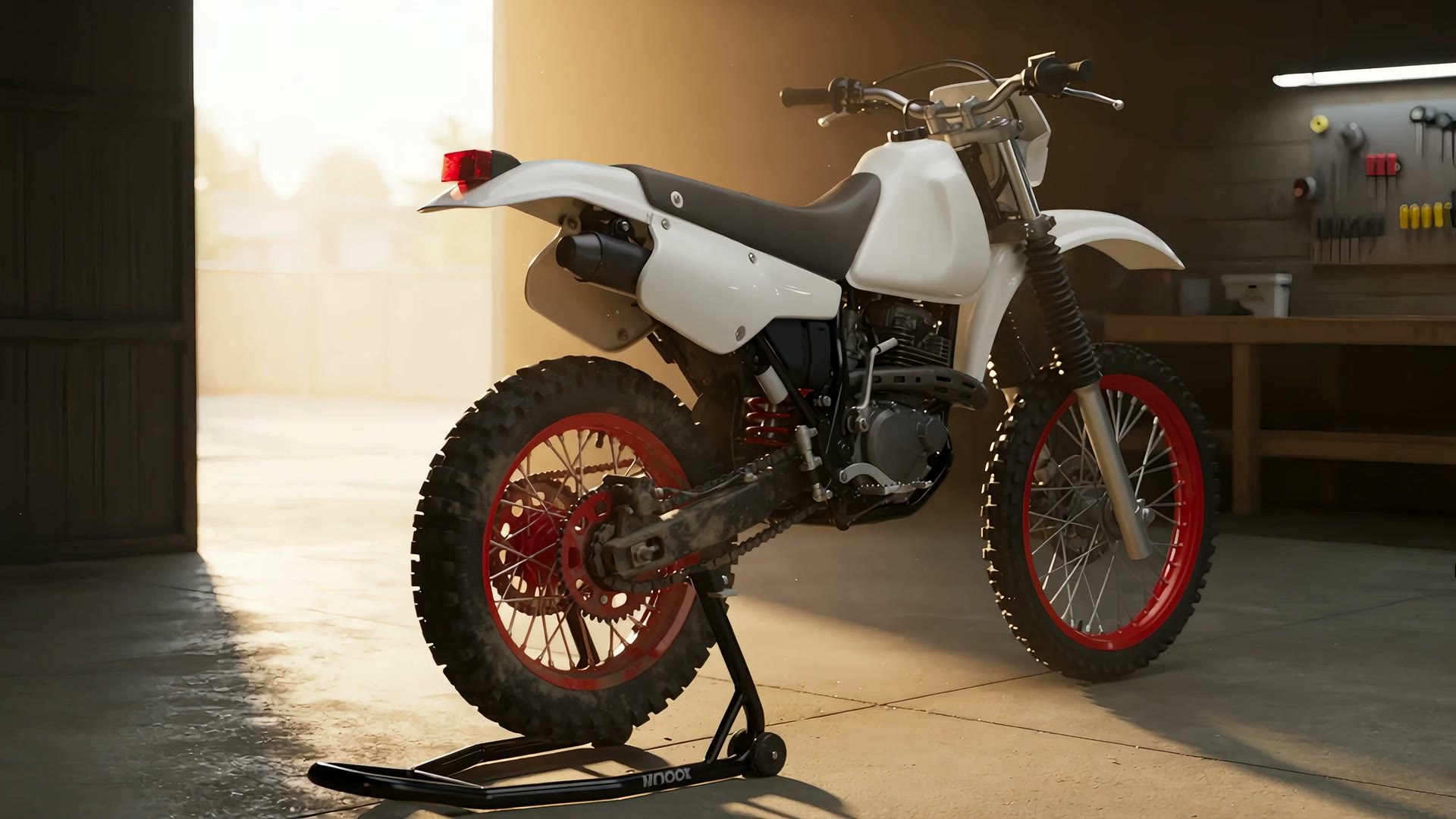 A white nineties enduro bike on its stand in a workshop, backlit